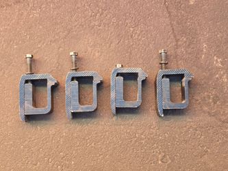 Camper shell hold down clamps