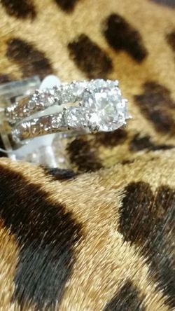 Sterling.. silver. Genuine. 2 piece solitaire set....