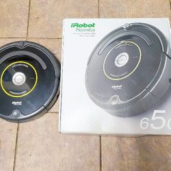 Irobot Roomba automatic vacuum with box and components 65 bucks. It works perfectly and holds a charge. Ready to go. 