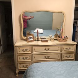 Dresser and mirror. Dresser is 59” wide, 32” tall and 18 deep. French Provençal nice piece to center your room around. All drawers worker well.