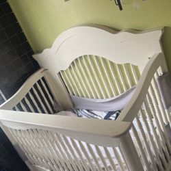 Beautiful white baby crib 