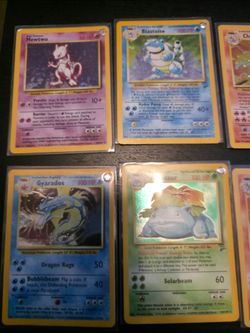 Base and base 2 holos....charizard, blastoise, mewtwo and more...