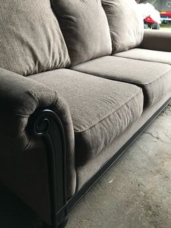 Gray Fabric Sofa with Dark Wood Frame