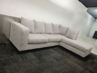 Free Delivery Today! Steam cleaned! Absolutely beautiful sectional couch with lounge. No stains or rips! Very comfy. Sofa
