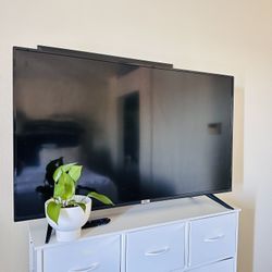 TCL 50" Class 4-Series 4K UHD HDR Roku Smart TV.