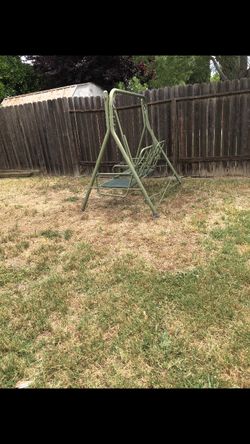Vintage rocking double chair in solid condition no cushions