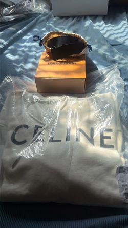 Louis Vuitton belt and Celine hoodie