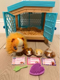 Little Live Pets, Mama Surprise, Soft, Interactive Mama Guinea Pig and her Hutch
