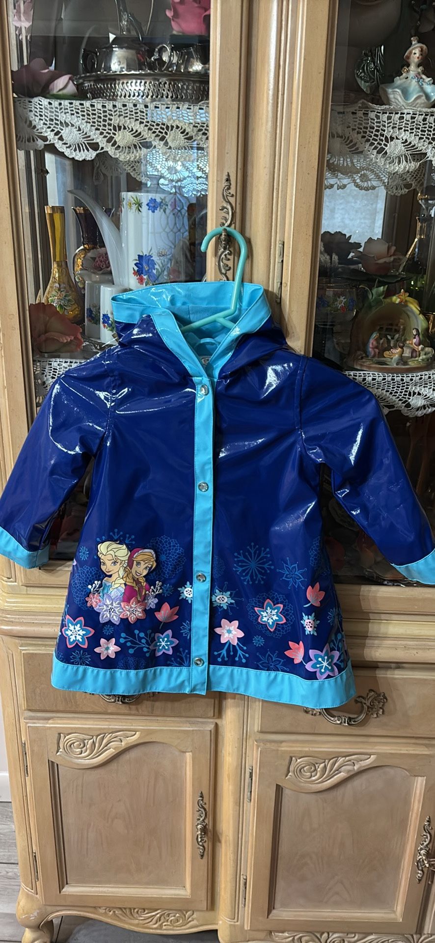 Disney Collection Frozen Anna and Elsa blue lined rain coat with hood Size 3
