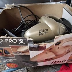 Hand Held Vacuum With Lots 1