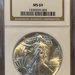 1986 SILVER AMERICAN EAGLE 🦅 MS69 NGC BROWN LABEL 