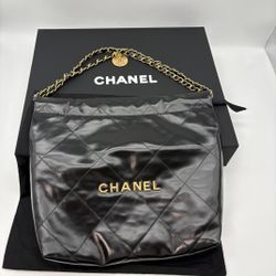 100% authentic Chanel  22 Small  Handbag with Shiny Calfskin&Gold-Tone Metal in Black