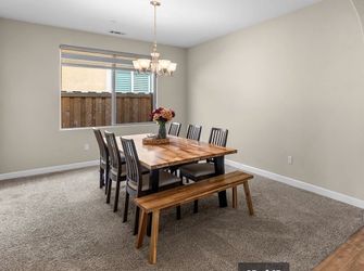 IKEA dining table with 6 chairs and a bench