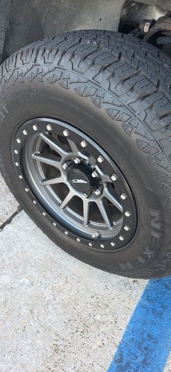 6 lug all terrain wheels and tires excellent condition