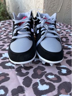 The Jordan Stadium 90 Low TD Football Cleats in the "Black Cement" colorway (Style Code: HQ0210-060)