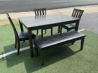 dining table with chairs and bench