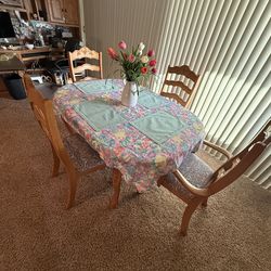 Oak dining table with 4 chairs