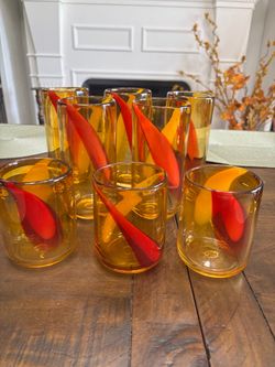 Eight mid century modern Murano style blown thick drinking glasses