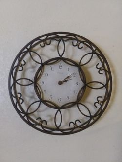 Wrought iron clock 13in