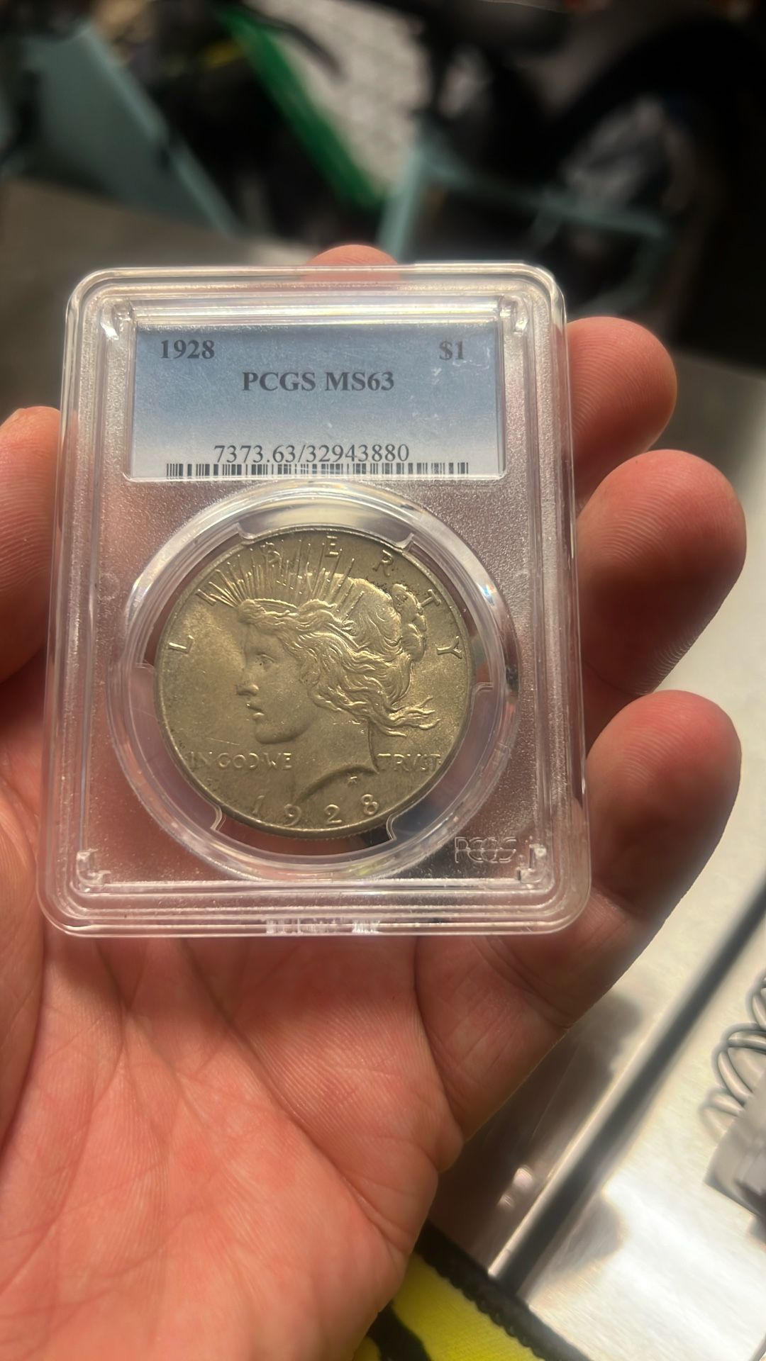1928 key date MS 63 Peace Dollar