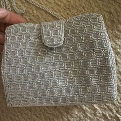 Silver sequined mini bag with long strap 