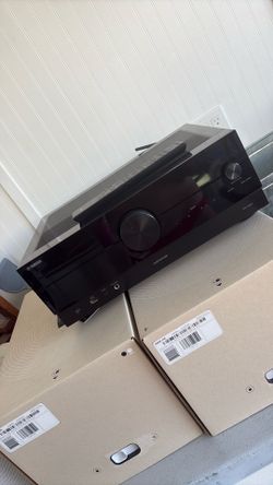 Yamaha rx-a2a receiver. 100 watts per channel, but his thing kicks ass but swapped out for Sonos.
