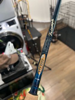 New with tags St Croix Triumph 7 ft medium heavy fast 1 piece casting rod with Shimano SLX 151 reel
