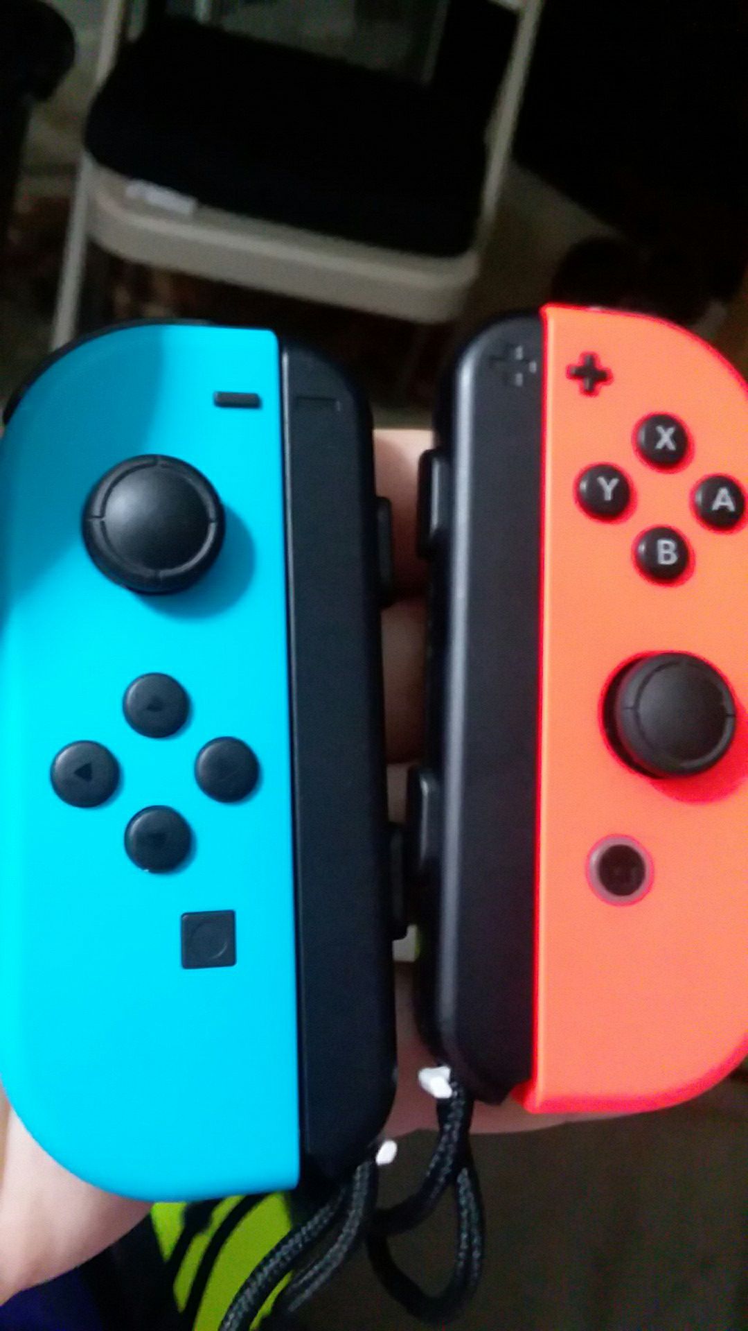 Nintendo joycons light blue and red