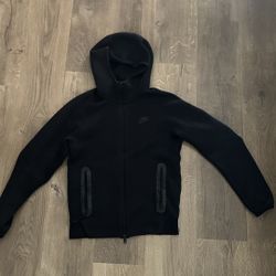 All black Nike Tech