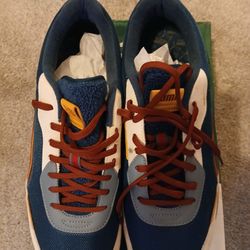 MULTI COLOR PUMA TENNIS SHOES/MEN 13
