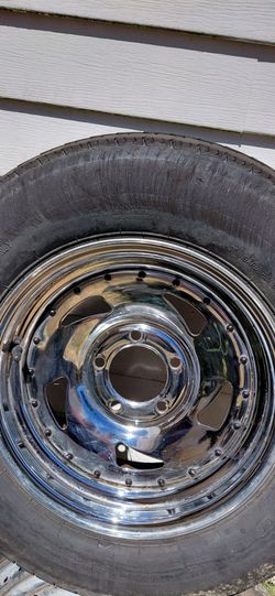 Tires and wheels off boat trailer