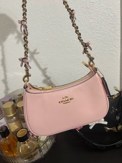 Brand new Coach soft pink mini Teri with bow strap