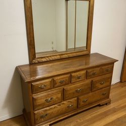 VINTAGE SOLID WOOD 8DR DRESSER W/ MIRROR 56”W X 18”D X 68”H (INC MIRROR)