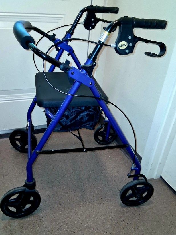 Walker Drive Brand Medical Use ▫️ Indoor ▪️outdoor excellent Condition , Storage 🧳 Nice with Padded Backresst, Brakes Work Good 👍too! 👌