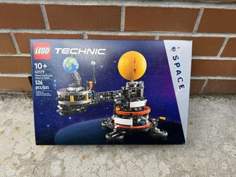 Planet Earth And Moon In Orbit