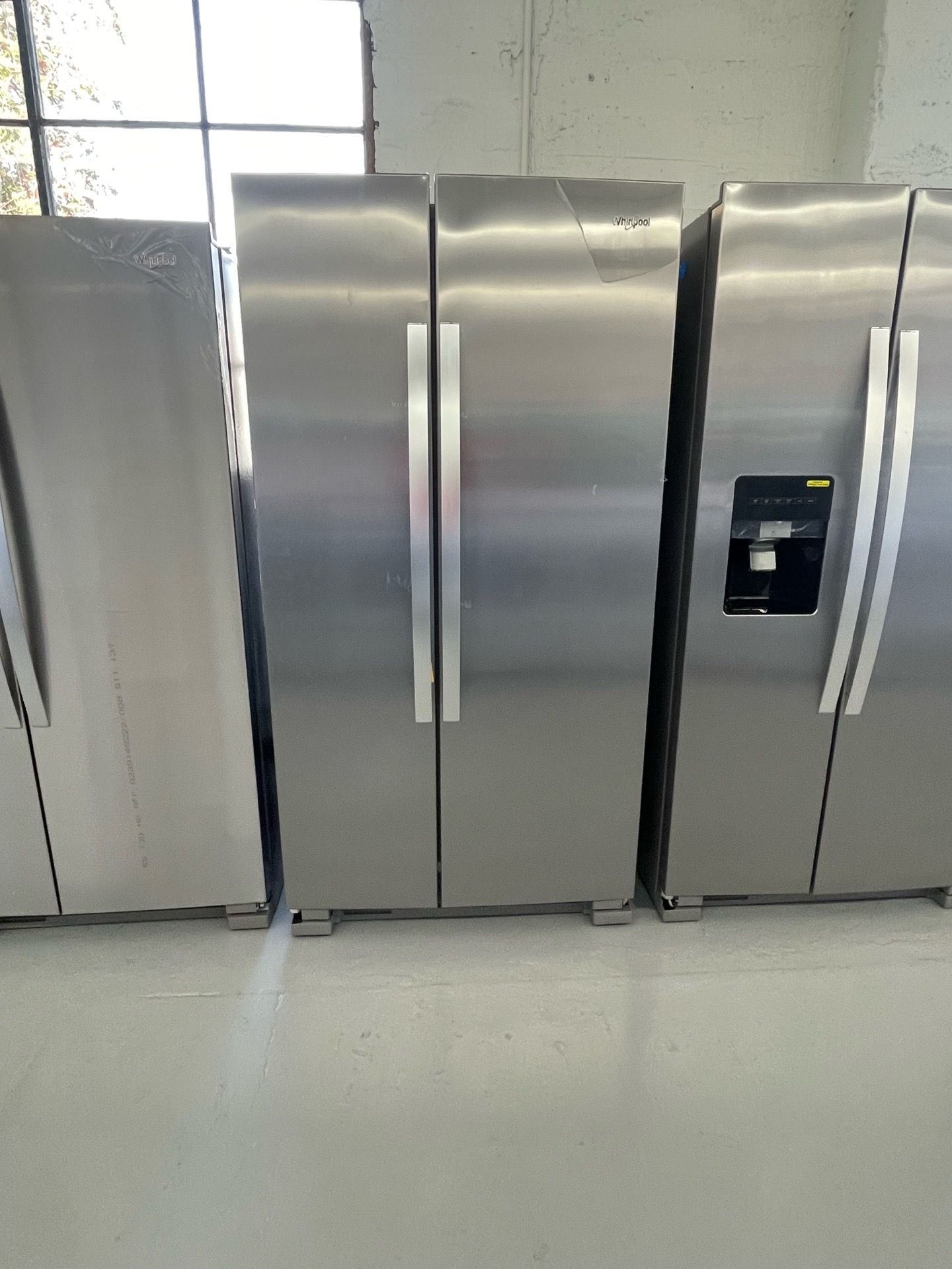Whirlpool 25 cu. ft. Side by Side Refrigerator in Monochromatic Stainless Steel