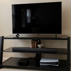 Modern 3-Tier Black Tempered Glass TV Stand – Excellent Condition