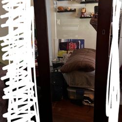 Standing mirror with jewelry storage 