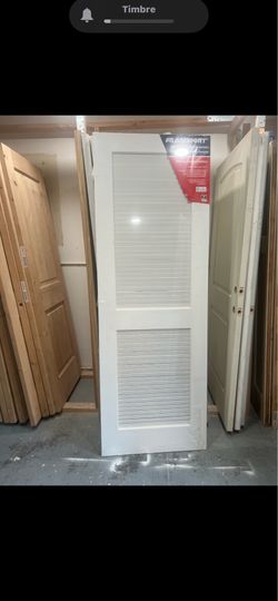 Louvre door 28x80 pantry door laundry door vented door  I have sold wood louver door. Door measuring 28x80 solid wood. I have door jams for sale for t