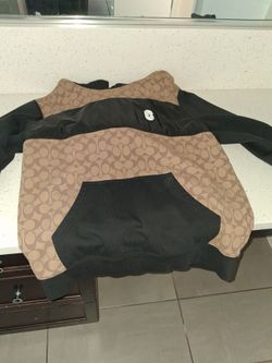 Coach signature pullover