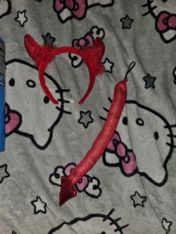 Devil horns and tail