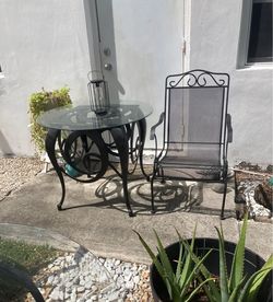 Outdoor metal frame glass roped table and metal chair
