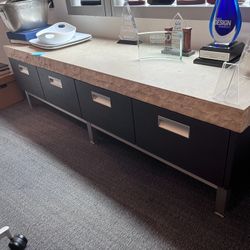 Limestone console table with wood veneer cabinets