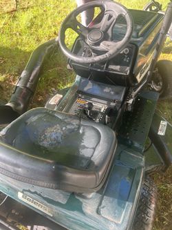 Tractor mower with accessories