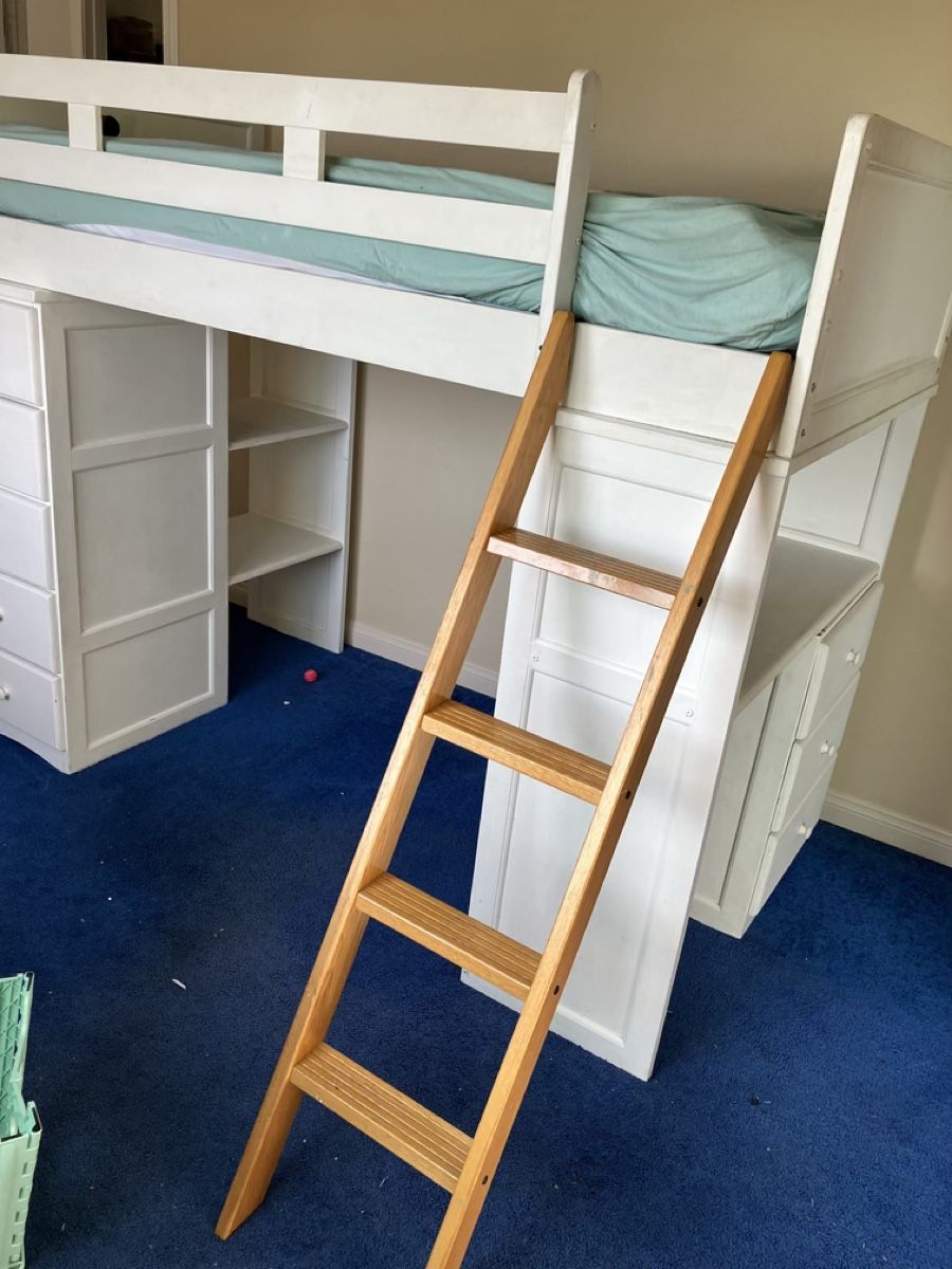 White twin loft bed with built-in desk and drawers