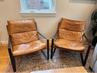 Pair of leather lounge chairs