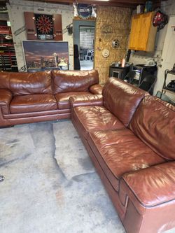 Leather love seat and recliner cuddle chair