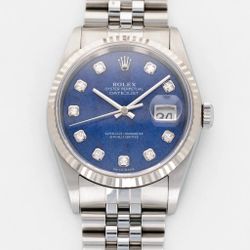 ROLEX STEEL OYSTER PERPETUAL DATEJUST SODALITE REF. 16234G WITH PAPERS