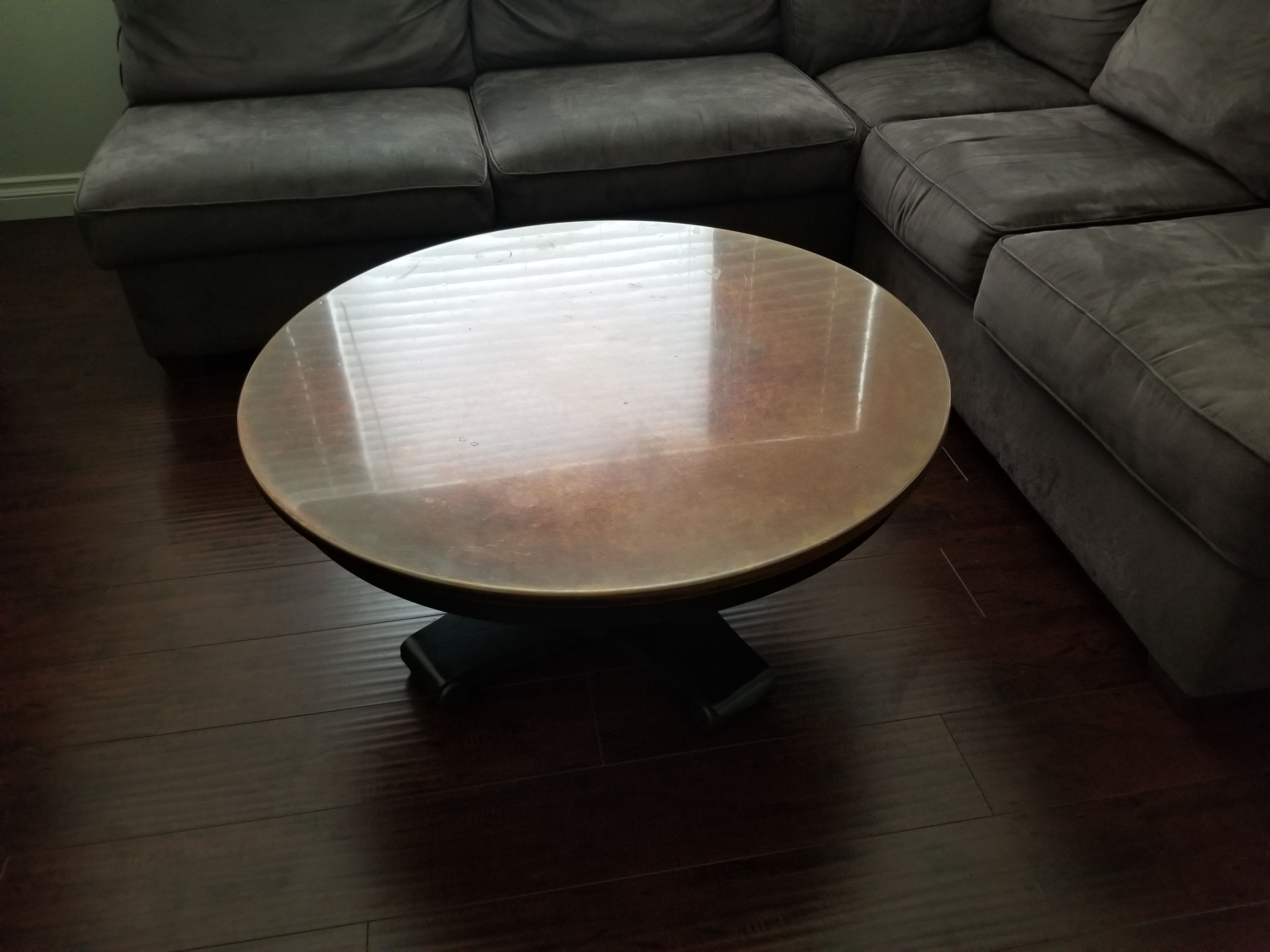 Crate and Barrel copper top coffee table. for Sale in Riverside