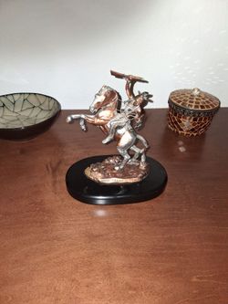 Native American brass sculpture